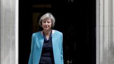 Britain's Home Secretary, Theresa May, leaves after a cabinet meeting in Downing Street in central London