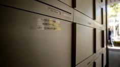 The names of Tezos Stiftung foundation and the companies Monetas AG and Crypto Valley GmbH are seen on a post box at an office building in Zug, Switzerland October 5, 2017. REUTERS/Arnd Wiegmann 