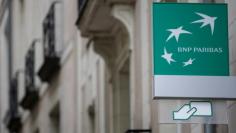 FILE PHOTO: The logo of BNP Paribas bank is pictured on an office building in Nantes, France, July 21, 2017. REUTERS/Stephane Mahe/File Photo     