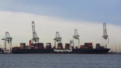 Shipping containers are unloaded at Roberts Bank Superport in Delta,