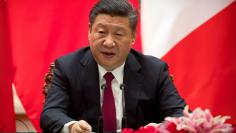 Chinese President Xi Jinping speaks during a joint press briefing with French President Emmanuel Macron, not shown, at the Great Hall of the People in Beijing, China January 9, 2018. REUTERS/Mark Schiefelbei/Pool