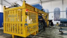 Workers make concrete slats for pig farm floors at Hog Slat's facility in Xiuwen county near Guiyang