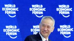 Liu He, Member of a Political Bureau of CPC Central Committee, smiles during the World Economic Forum (WEF) annual meeting in Davos, Switzerland January 24, 2018.  REUTERS/Denis Balibouse