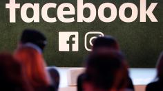 A Facebook logo is seen at the Facebook Gather conference in Brussels, Belgium January 23, 2018. REUTERS/Yves Herman  