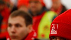 Members of German industrial trade union IG Metall takes part in a 24-hour strike at VAC (VACUUMSCHMELZE) plant in Hanau, Germany, January 31, 2018.    REUTERS/Kai Pfaffenbach