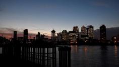 FILE PHOTO - The Canary Wharf financial district is seen at dusk in London, Britain, November 17, 2017. REUTERS/Toby Melville