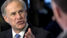 FILE PHOTO - Texas governor Greg Abbott speaks during an interview on the floor of the New York Stock Exchange