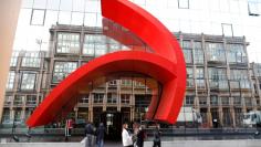 Employees gather outside a Societe Generale bank building in Fontenay-sous-Bois