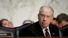 Senate Judiciary Committee Chairman Chuck Grassley (R-IA) listens as U.S. Attorney General Jeff Sessions (not pictured) testifies before a Senate Judiciary oversight hearing on the Justice Department on Capitol Hill in Washington, U.S., October 18, 2017.