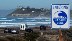 FILE PHOTO:    A tsunami sign is shown along the coastal highway in Cardiff, California