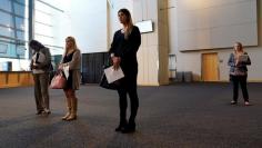 FILE PHOTO: Job seekers listen to a presentation at the Colorado Hospital Association job fair in Denver, Colorado, U.S., October 4, 2017. REUTERS/Rick Wilking/Files